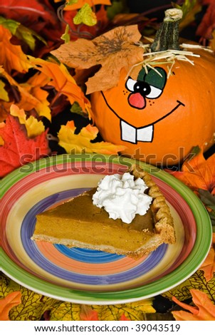 thanksgiving pumpkin pie with fun pumpkin