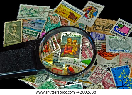 vintage holiday stamp under magnifier