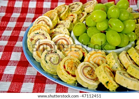 spiral appetizers with green grapes