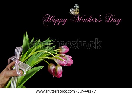 man with tulip bouquet for mom