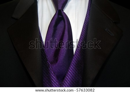 stock photo purple satin tie with black tux