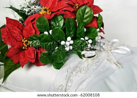 stock photo christmas bridal bouquet on satin pillow with rings