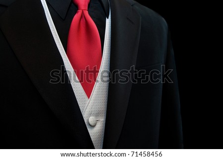 stock photo red tie accenting a black tuxedo