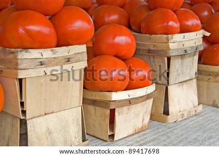 tomatoes in produce boxes