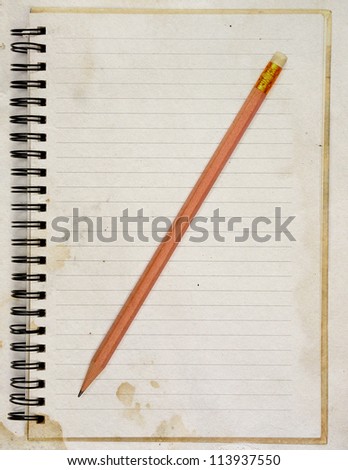 Old Blank note paper with pencil. isolated on white.