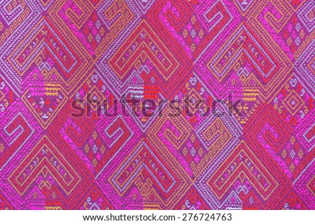 Colorful thai silk handcraft peruvian style rug surface close up for background or texture