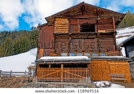 Barn on a slope in winter