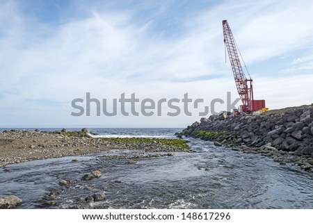 Work in progress protecting a small harbor in the Azores