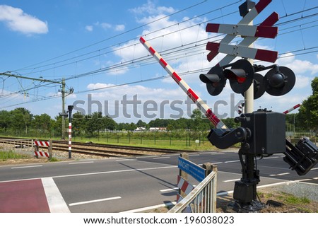 Closing barriers of a rail crossing