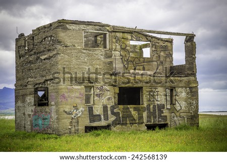 ICELAND - JULY 4, 2014: An abandoned house falling into ruin in rural south Iceland.  Many people have abandoned rural areas for Reykjavik.