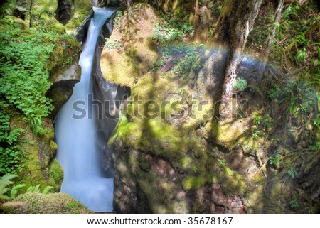 Ladder Creek Falls and rainbow in the North Cascades
