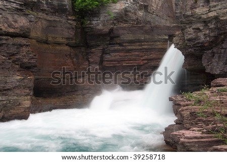 A beautiful waterfall in Glacier National Park, Montana