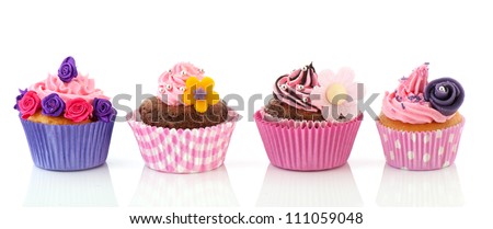 Row colorful cupcakes with chocolate and pink butter cream