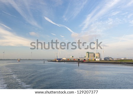 Fabrics and wind mills in harbor