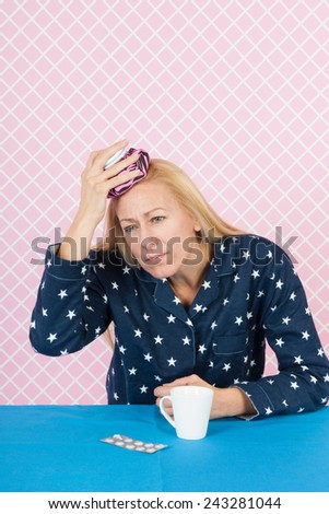 Woman of mature age with headache at night