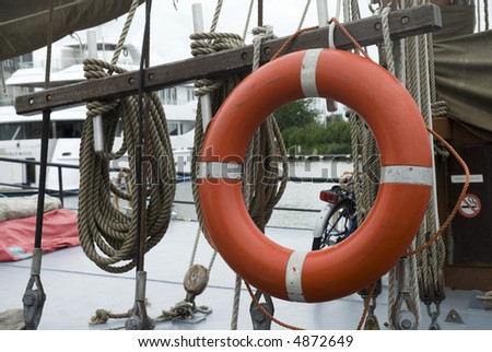 lifebuoy on board from a ship in the harbor