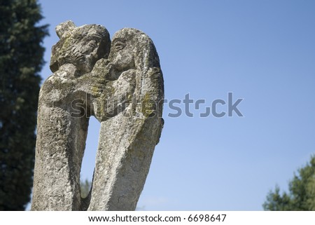 Jesus and Mariah loving in stone
