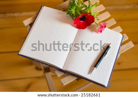 Empty book with pencil to write