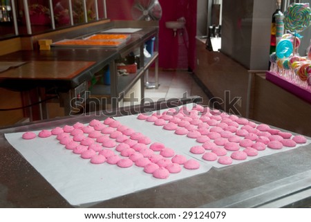 Making pink candy in the candy-kitchen