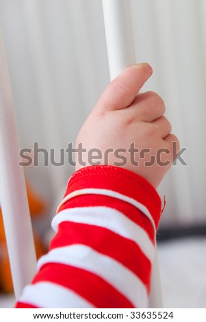 Hand Holding Pole