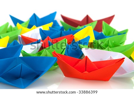 Paper boats in different colors