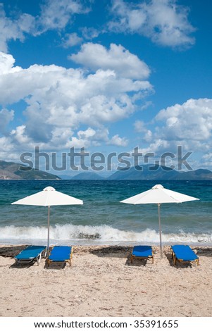 Beach at the Greek ionian island Kefalonia with parasols