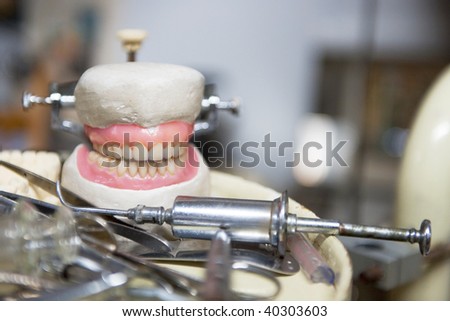 old dentures and metal work tools from the dentist