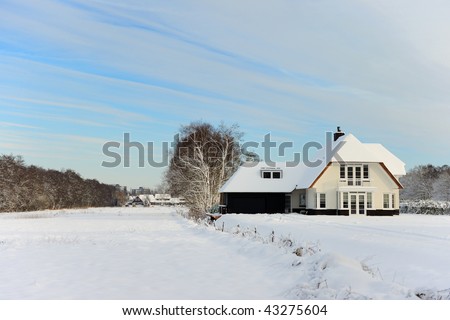 Winter landscape with luxury residential in Holland