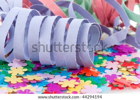 paper colorful party streamers on tiny flowers