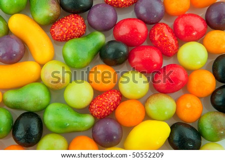 Many colorful candy sweets in fruit shape