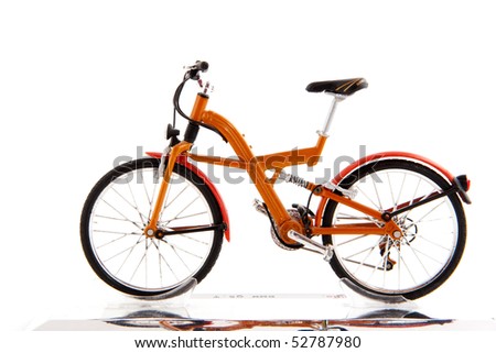 All terrain bike in orange isolated over white