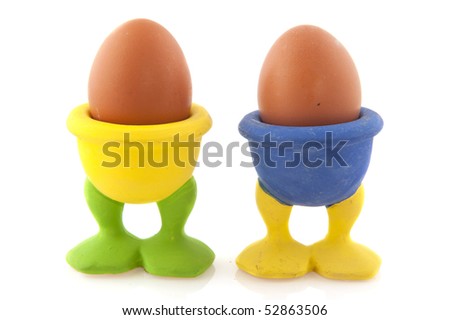 http://image.shutterstock.com/display_pic_with_logo/87573/87573,1273605872,3/stock-photo-brown-eggs-in-funny-cups-with-duck-feet-52863506.jpg