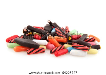 All sort licorice candy sweets isolated over white