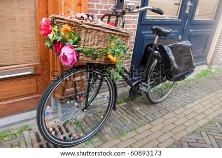 Dutch transport bike with basket and cheerful flowers