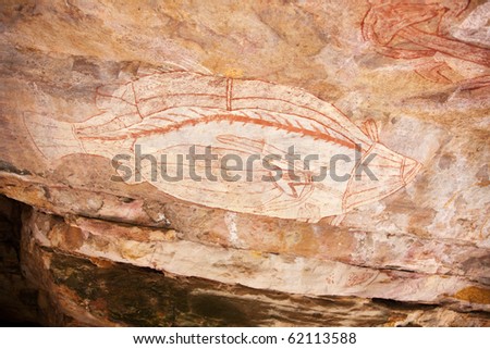 Aboriginal rock art paintings in landscape Australia