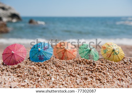 Colorful Chinese paper parasols for shade at the sunny beach