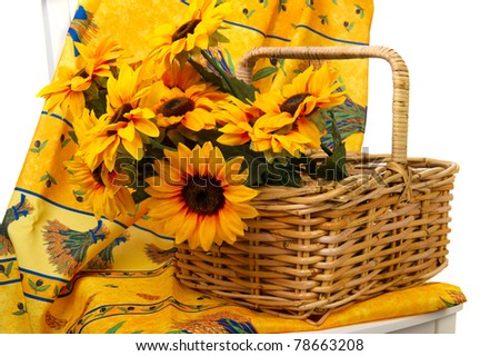 Romantic still life with a basket sunflowers on a white chair with French Provence design