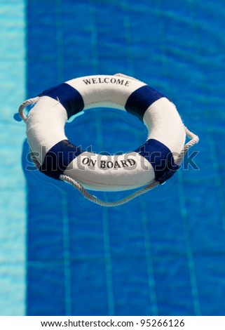 Welcome on board with life buoy in swimming pool