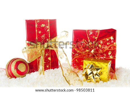 Presents and ornaments for Christmas in red and gold