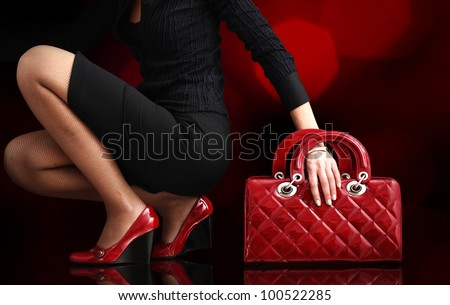 fashionable woman with a red bag, fashion photo