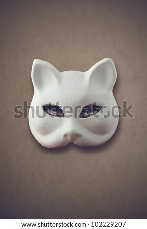 mysterious woman: woman\'s eyes with a cat mask
