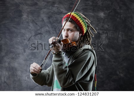 Rasta man musician playing violin