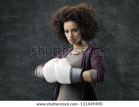 Fashion model with white boxing gloves