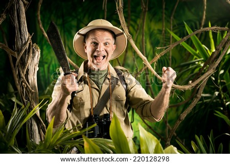 Cheerful adventurer with machete and fists raised in the jungle.