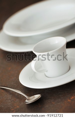 Place setting in a restaurant, close-up soft focus