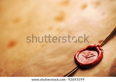 wax seal on a grunge paper, copy space