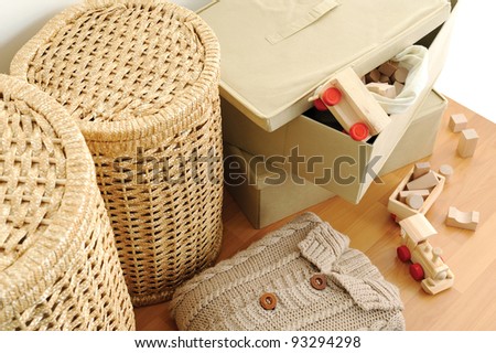 wicker containers for home, on wooden floor, top view