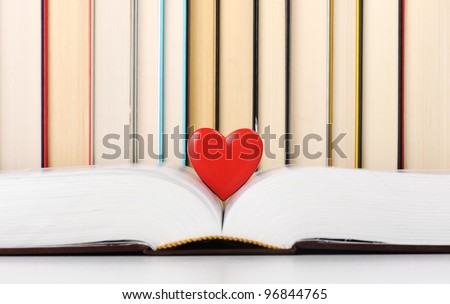 love books, open book with heart, pile of book on background