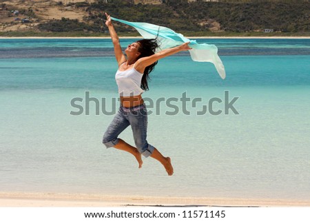 Woman, sun, ocean and blue scarf. Caribbeans.