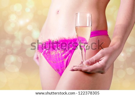 girl in lingerie with a flute of champagne